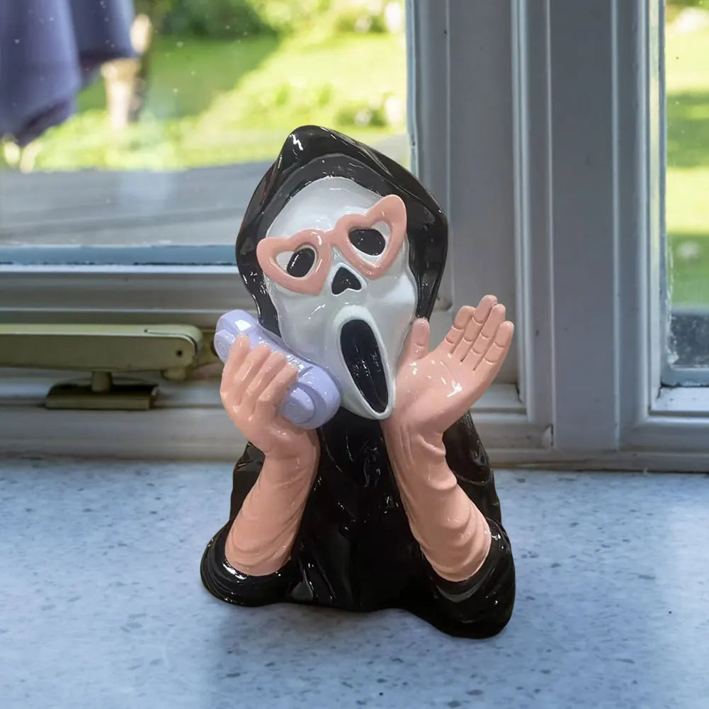 Screaming Face Ghost Figurine